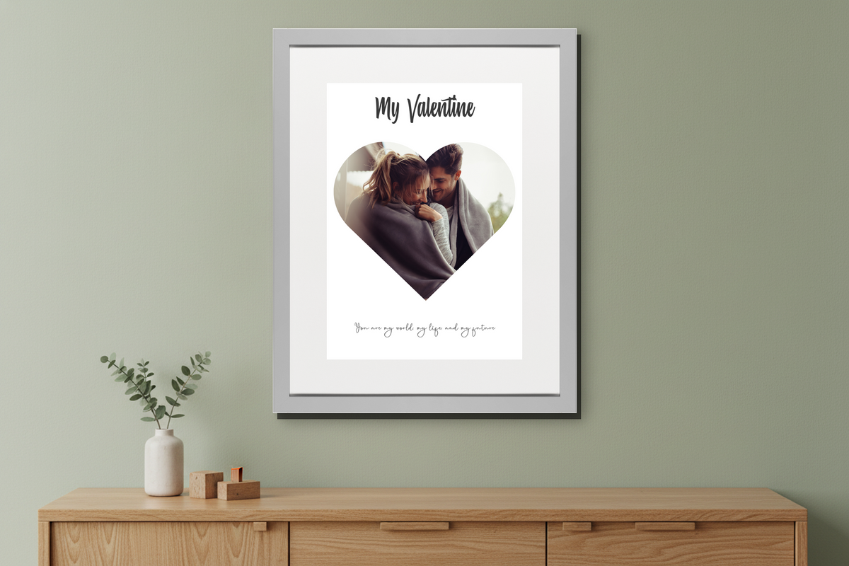 A framed "My Valentine" Heart Portrait Professional Print featuring a couple in a heart shape, with customisable text below, displayed in a living room setting. - framed sage sideboard