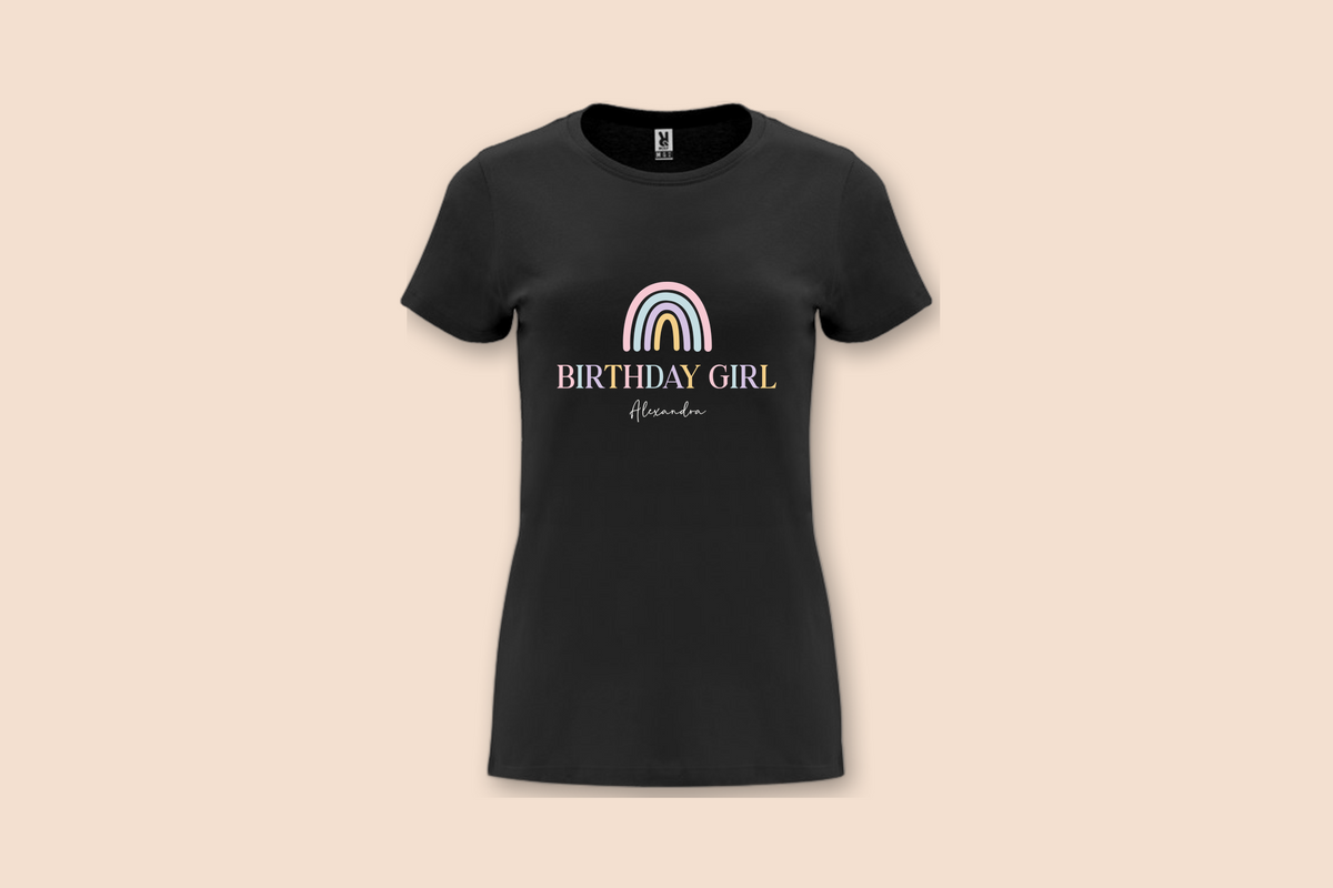 This black Pastel Rainbow Birthday Tee features a minimalist pastel rainbow design with "Birthday Girl Alexandra" text.